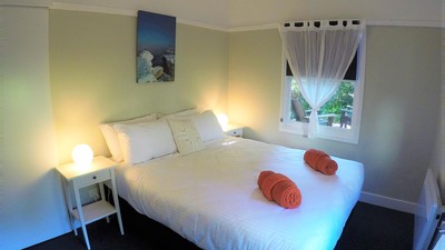 Bedroom 2 - Queen bed with garden view